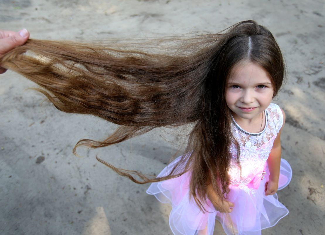 Девочка из Лисок установила рекорд России по длине волос
